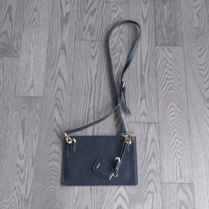 Beautiful black crossbody bag by fashion inspired